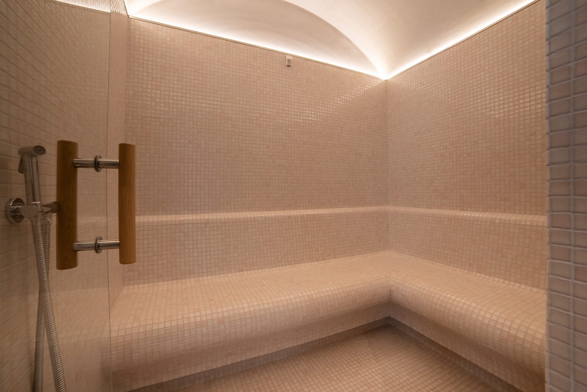 The hammam at NEMA, warm stone and low light